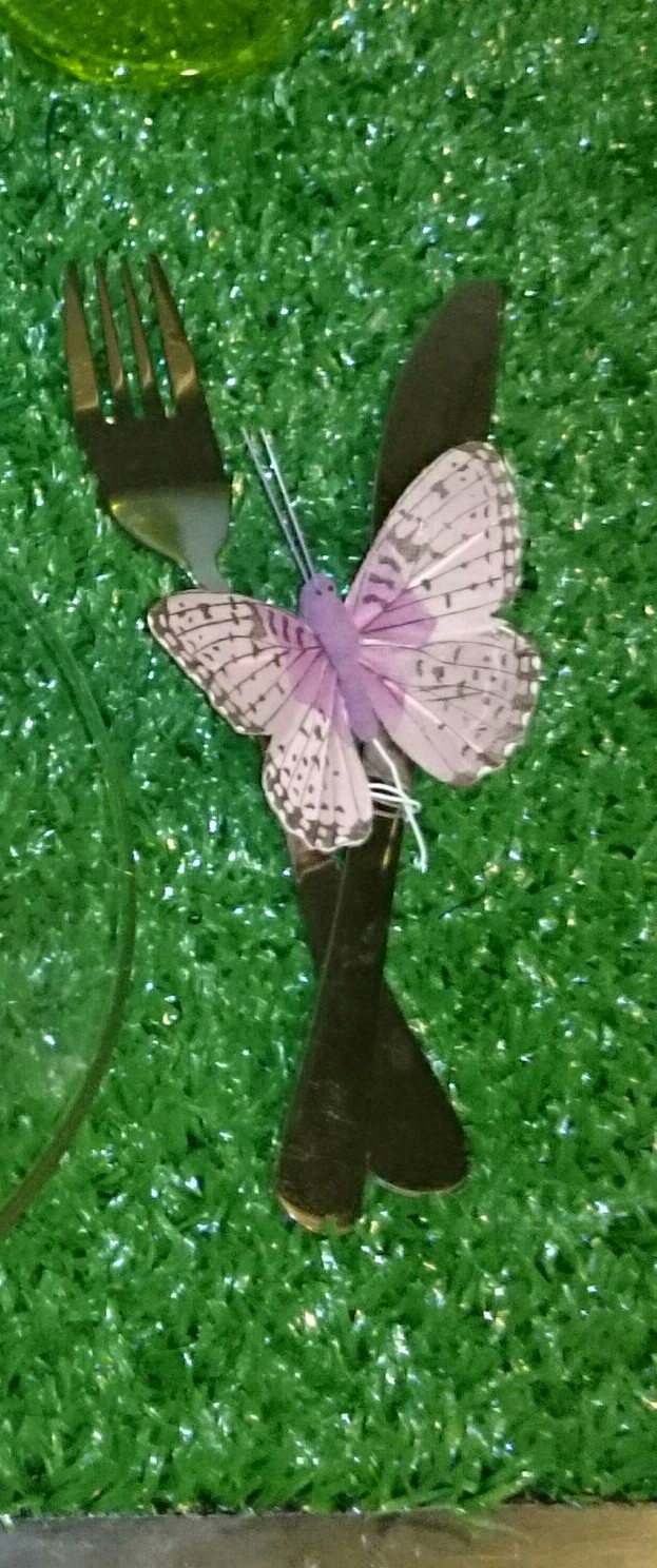 Talher preso com borboleta